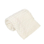 white knitted blanket on a white background