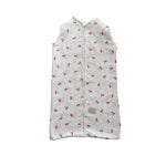 Baby Natur sleeveless sleeping bag with a white background and red cherry print. Made from soft, breathable cotton.