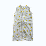 Baby Natur sleeveless sleeping bag with yellow lemons print, made of soft, breathable cotton. Perfect for safe and comfortable sleep.