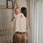 Baby NaturA 100% cotton muslin swaddle blanket with a French bulldog print, perfect for burping or as a crib liner.