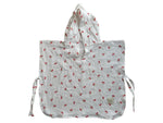 Baby Natur white muslin hooded poncho with a red cherry print and side ties.